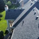 Completed residential roof replacement with architectural shingles by Weatherguard Construction