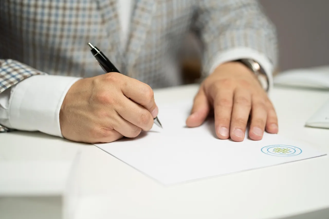 Homeowner reviewing a detailed contractor estimate document at kitchen table