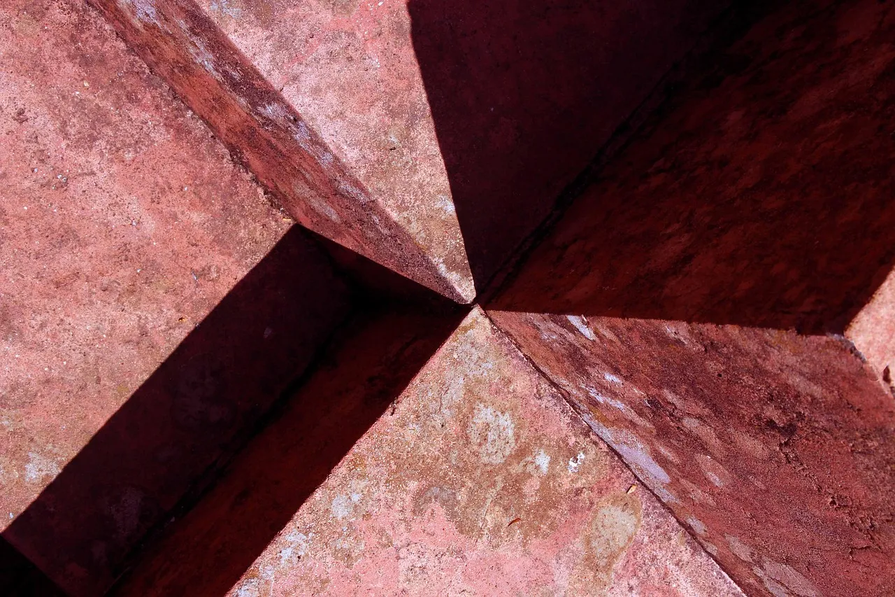 Side-by-side comparison of different paint sheen levels on exterior siding samples