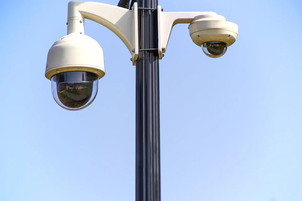 Modern home exterior featuring smart cameras, sensors, and automated lighting
