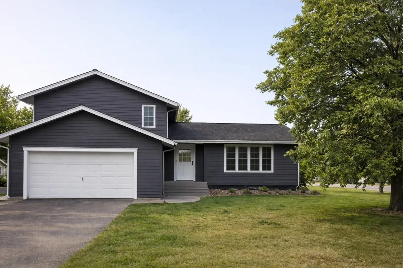 Dark Gray Siding Completed Home Garage