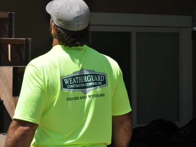back of high vis shirt that says weatherguard deck and windos